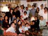 Familia Delibes de Castro con sus cónyuges e hijos en su casa de El Montico en Navidad.